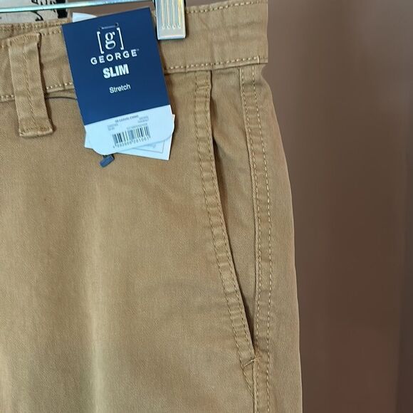 Waste 14 1/2 I think is 39 and inseam is 29 - Picture 2 of 9